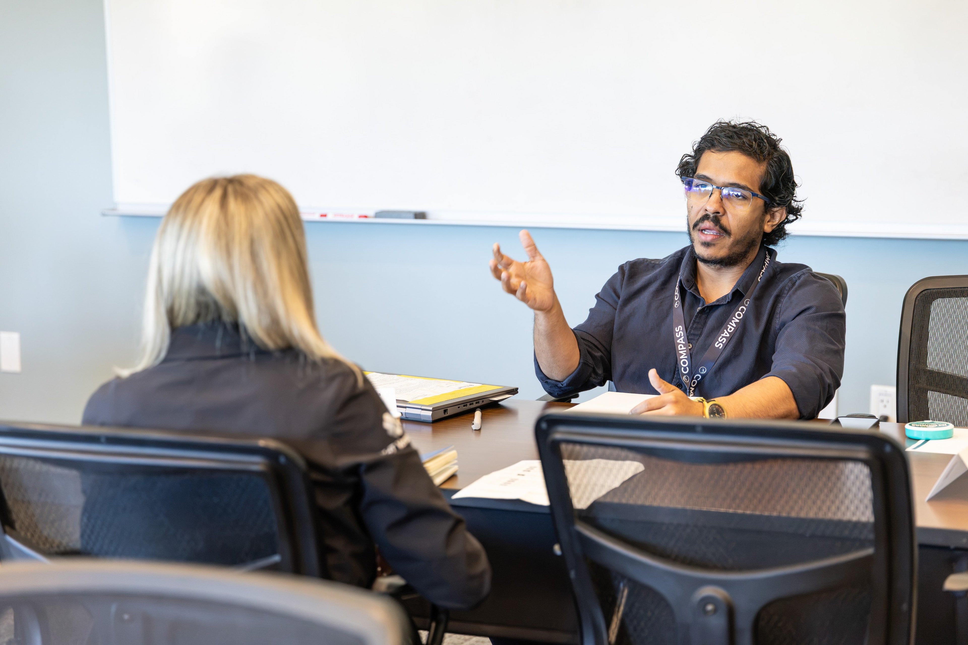 A national lab researcher explaining his technology in a one-on-one meeting