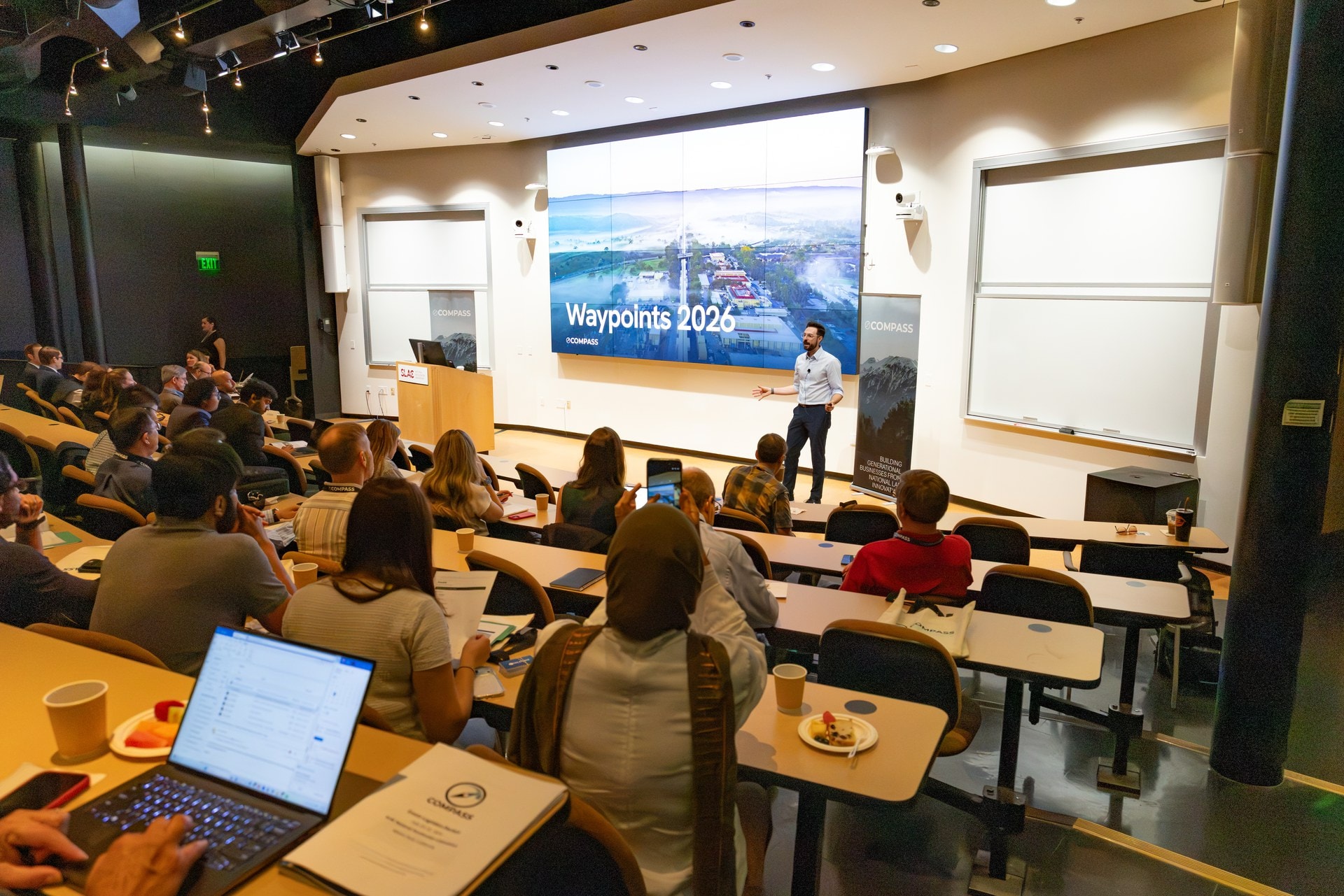 A full Kavli Auditorium at the start of Waypoints